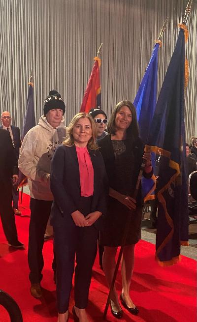 MCUL President/CEO Patty Corkery and MCUL Board Chair Heather Luciani at the opening flag ceremony for the 2022 CUNA GAC MCUL President/CEO Patty Corkery and MCUL Board Chair Heather Luciani at the opening flag ceremony for the 2022 CUNA GAC